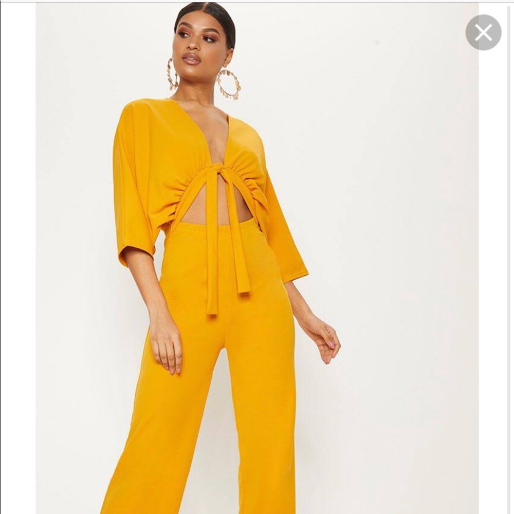 Pretty Little Things Mustard Crepe Cutout Jumpsuit